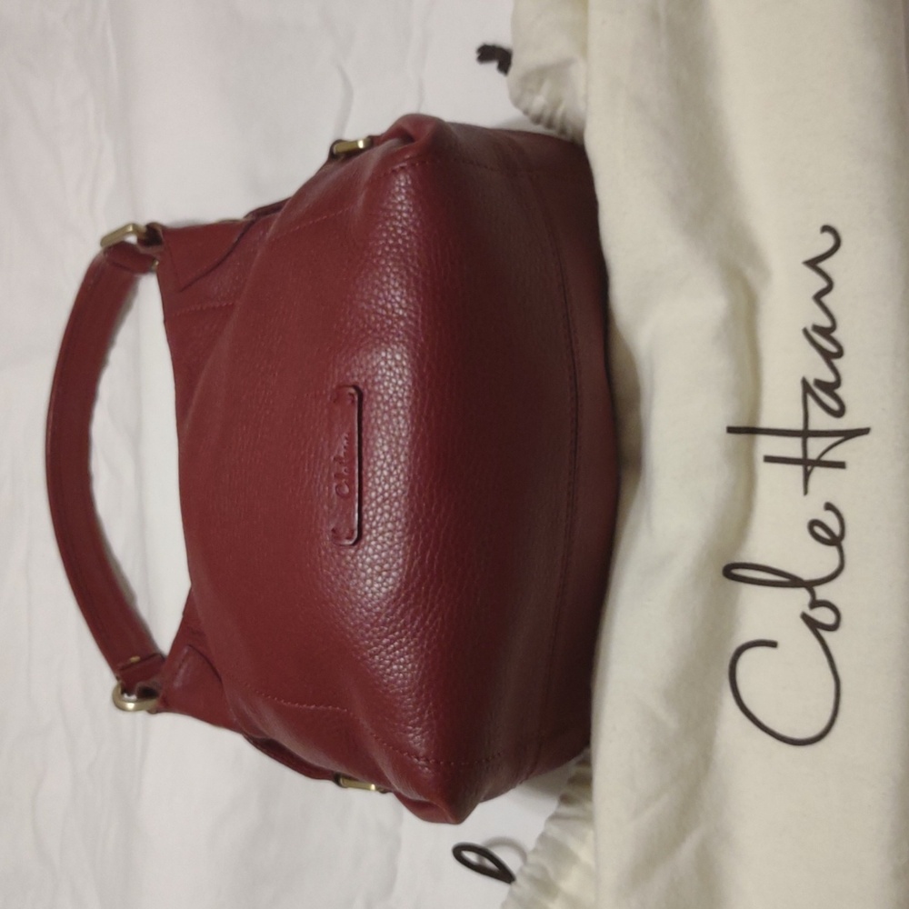 Rich Red Cole Haan handbag. In very good condition with storage bag